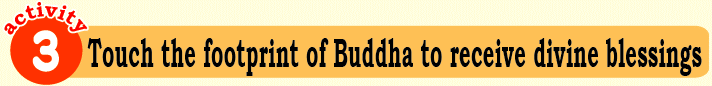 Touch the footprint of Buddha to receive divine blessings